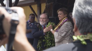Governor Neil Abercrombie and Warden Ruth Coller-Forbes untying the maile lei